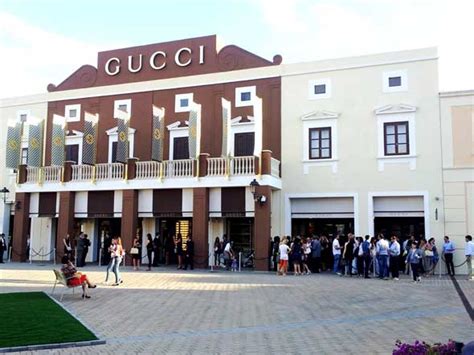 sicilia outlet village scarpe gucci|gucci outlet palermo italy.